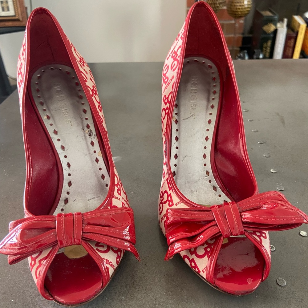 BCBGirls peep toe w/bow pumps. Red and cream.